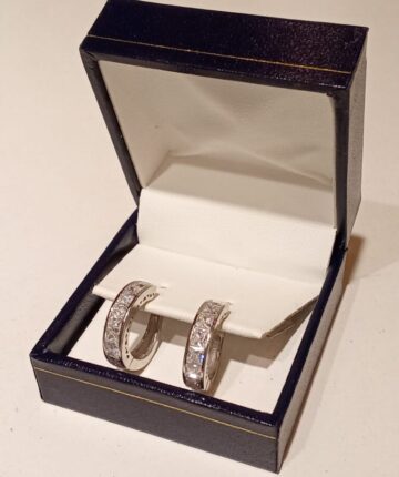 Aros en plata anchos con hilera