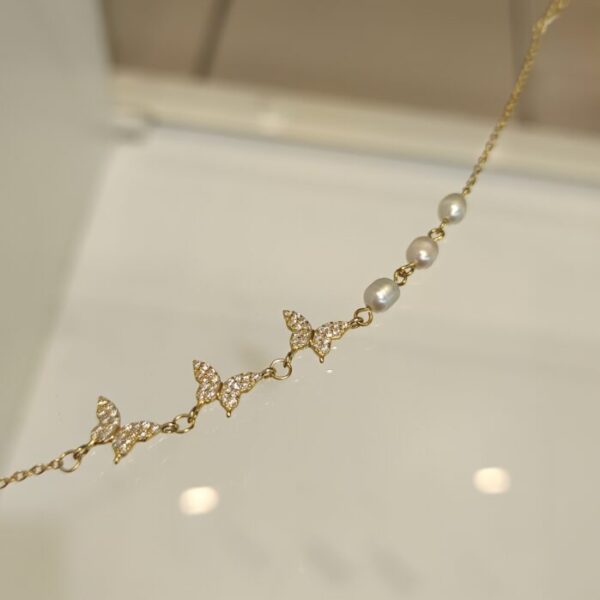 Pulsera perlas de río y mariposas con circonias