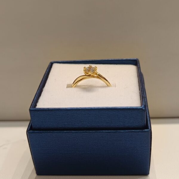Anillo Cintillo con circonia y 6 grifas