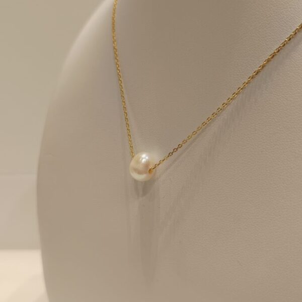 Conjunto con perla mediana